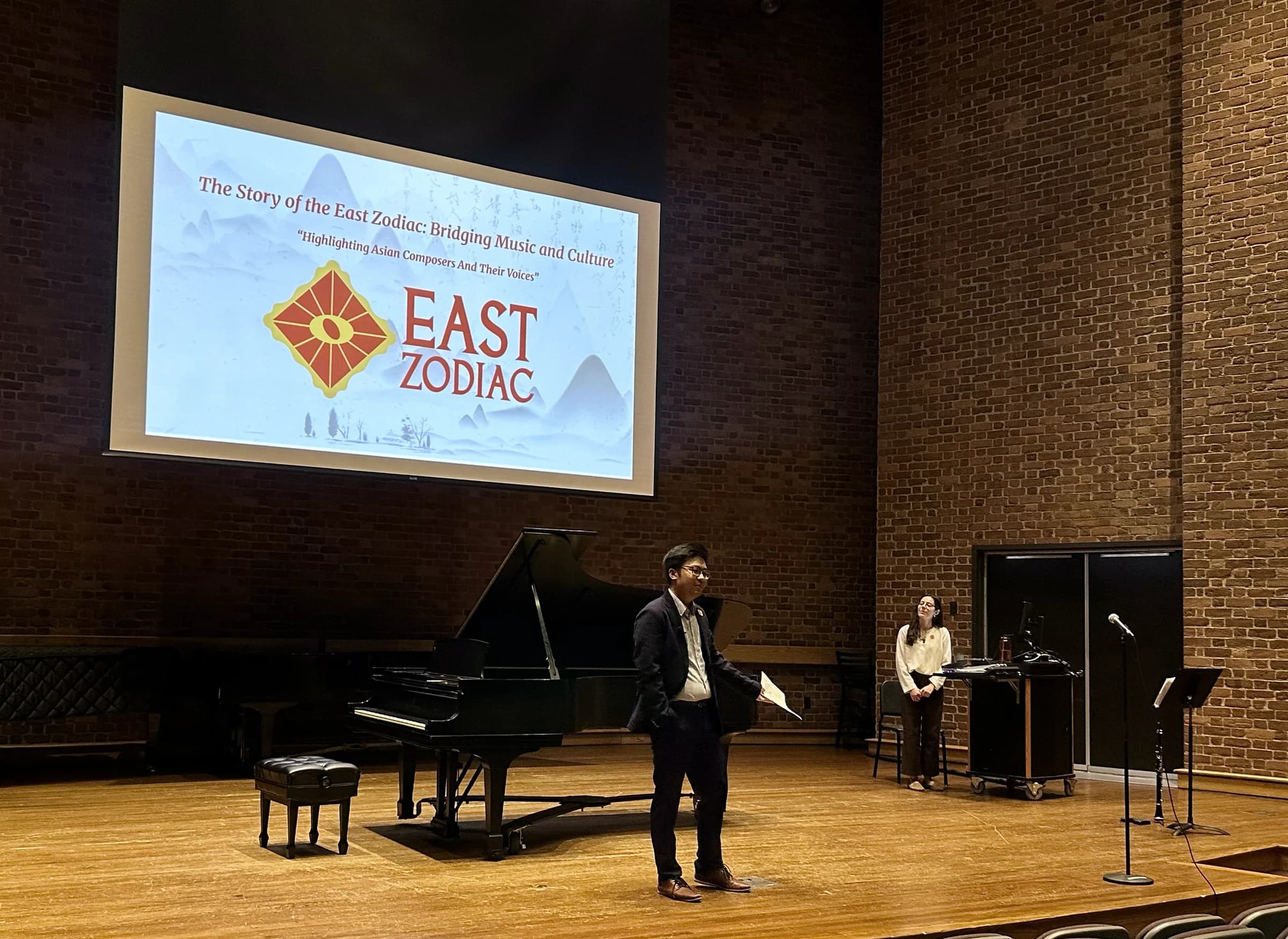 East Zodiac presenting a university lecture on Asian composers